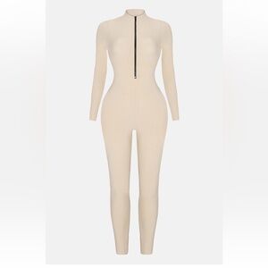 Fashion Nova Cream Snatched jumpsuit size small